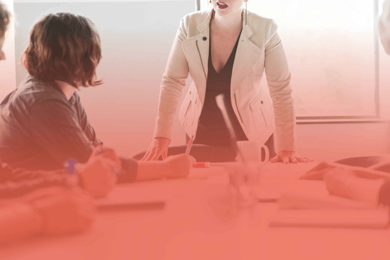 Business meeting illustrating the selection of a PIM development company based on expertise, collaboration, and implementation experience