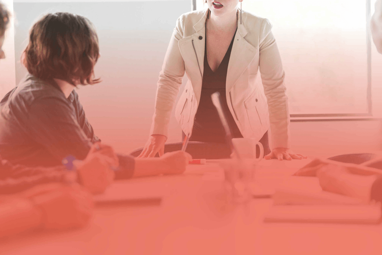 Business meeting illustrating the selection of a PIM development company based on expertise, collaboration, and implementation experience