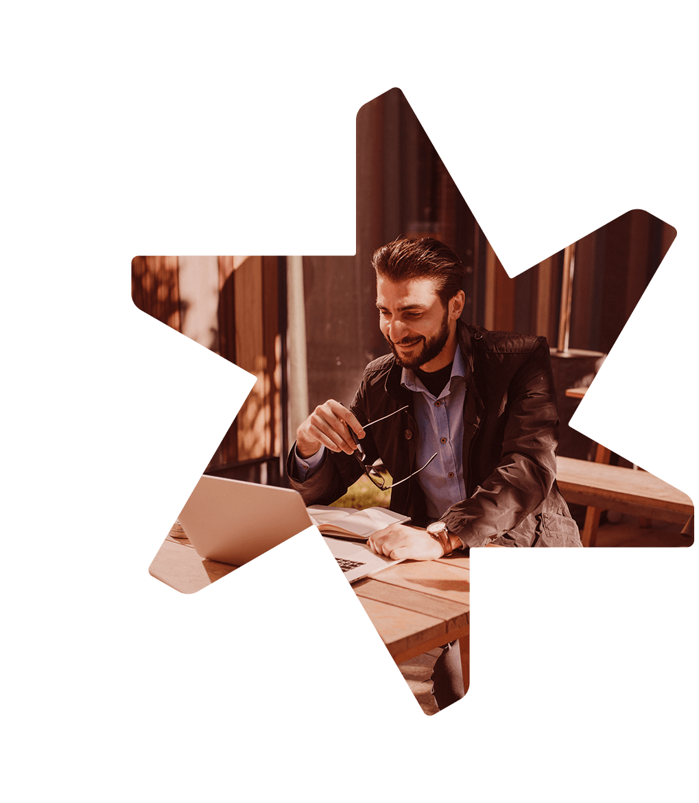 Man smiling during online meeting