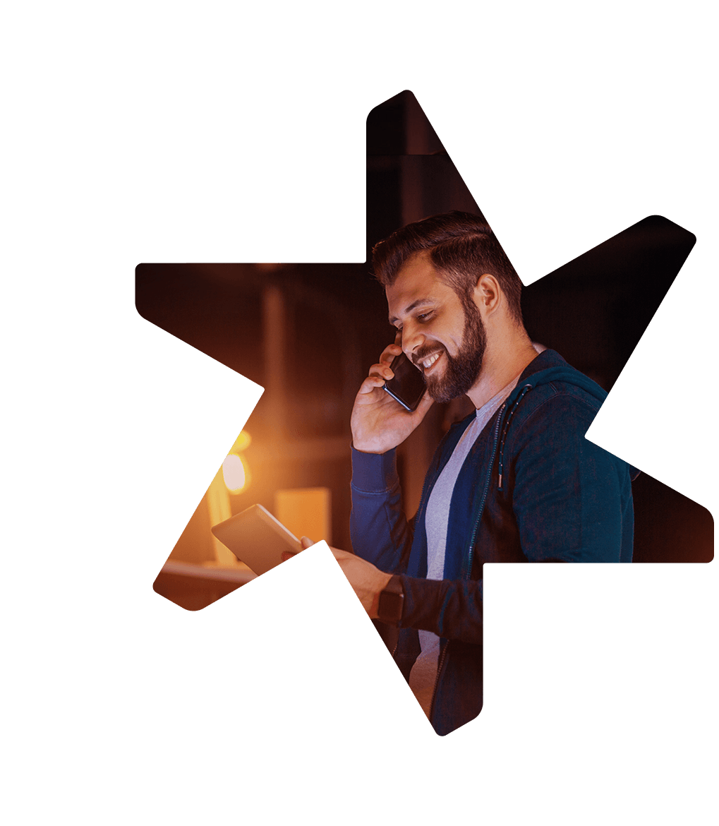 Tandemite banner: Man with a tablet talking on a phone