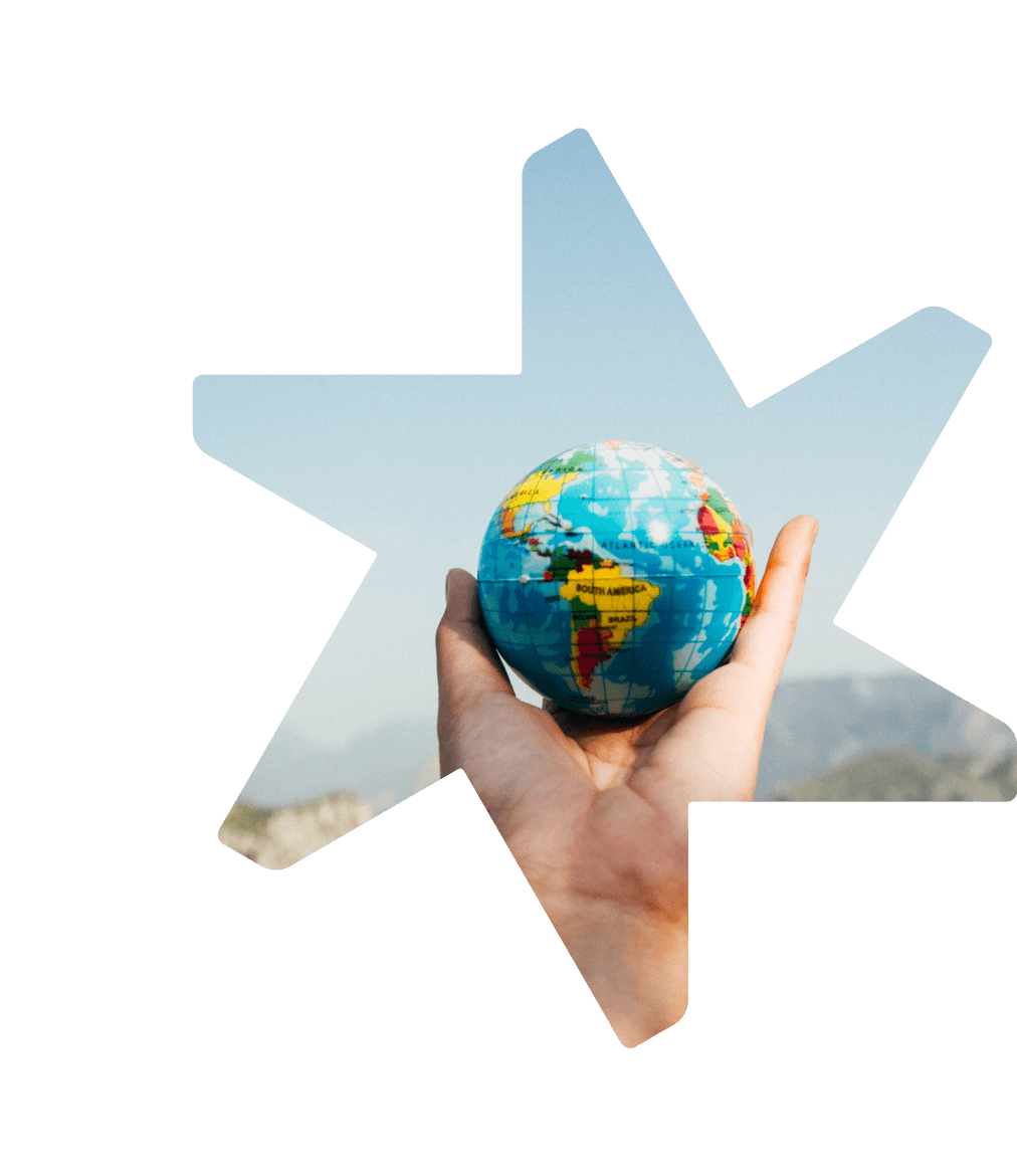 Tandemite banner: hand holding a globe