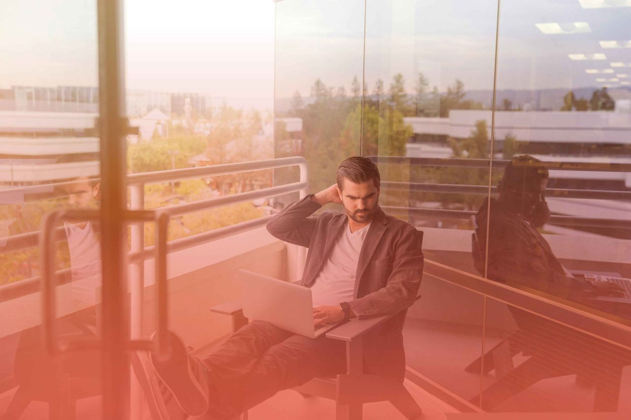 Professional using a laptop to evaluate Headless CMS solutions and modern content management strategies for digital platforms