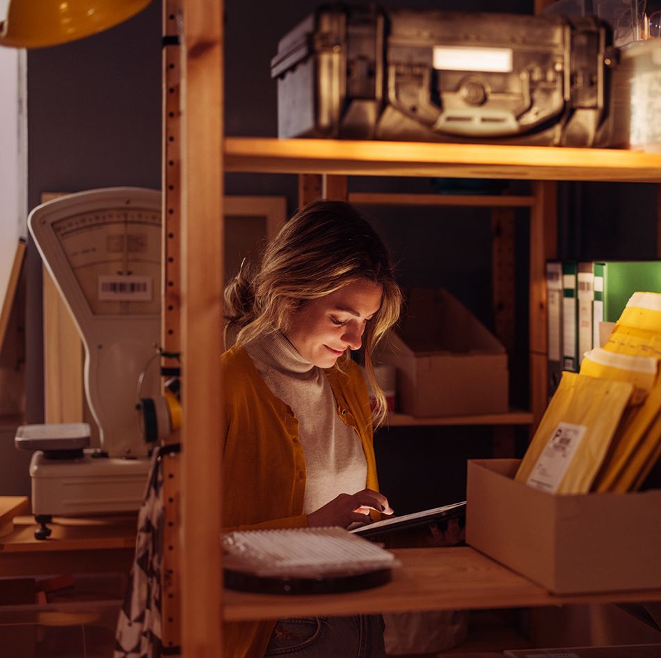 Woman working on a digital tablet_image