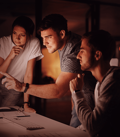 People looking at computer monitor thinking_image