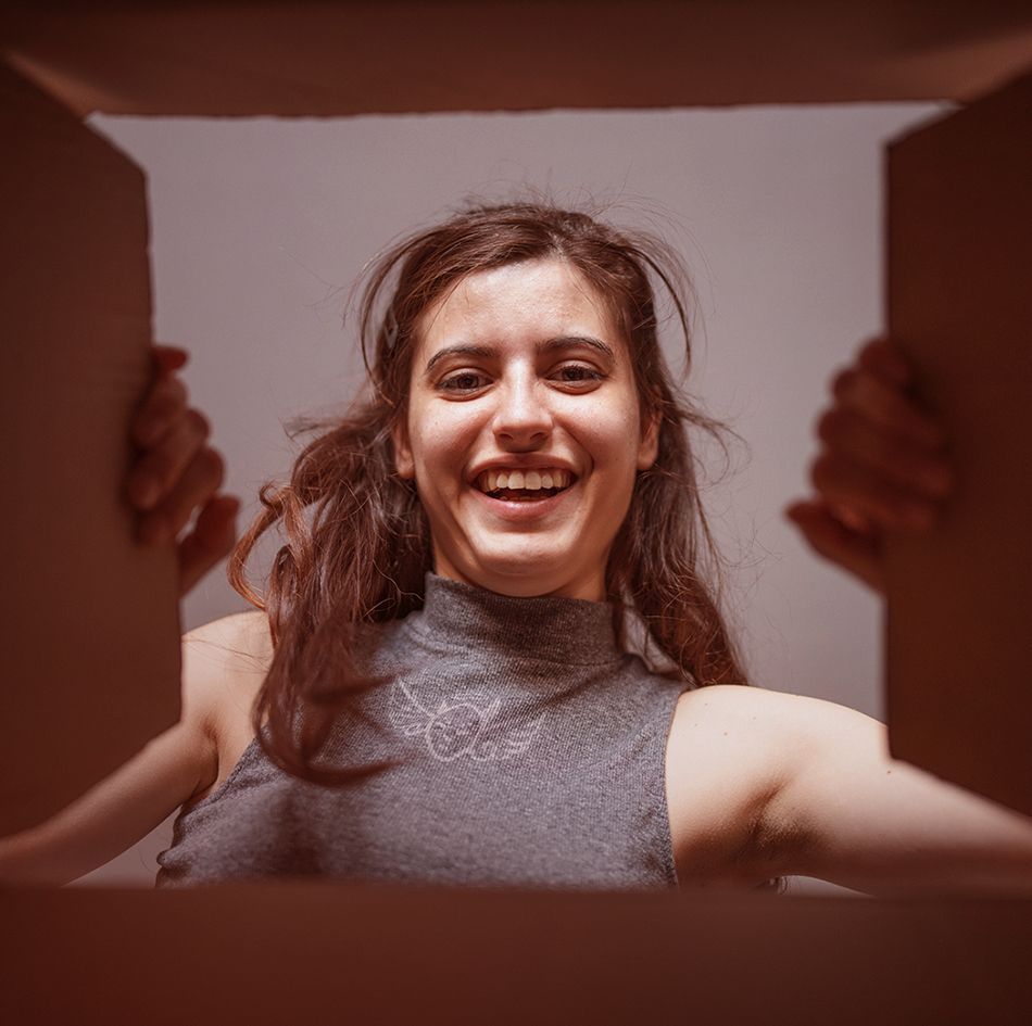 Woman during unboxing_image
