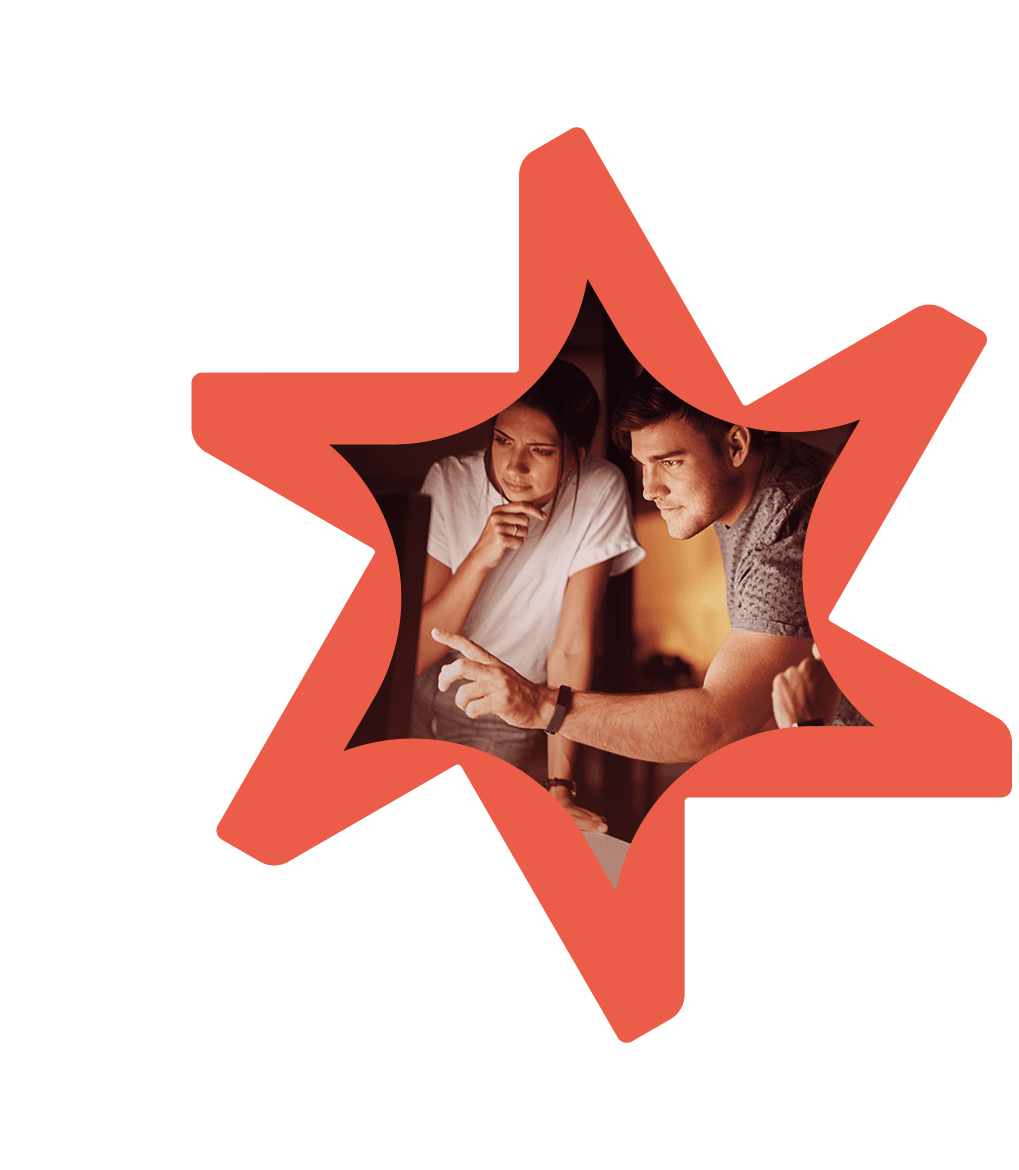 Tandemite banner: People looking at computer monitor thinking
