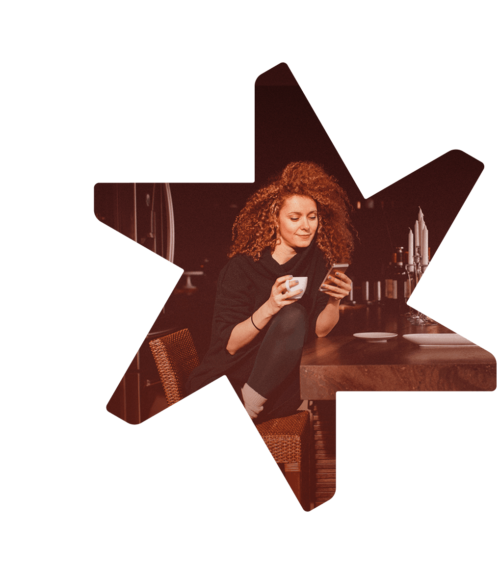 Tandemite banner: Woman scrolling a phone and drinking tea